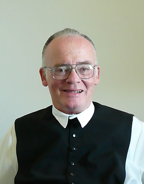 Photo of Fr. Robert E. Maguire