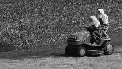 Two nuns of Valley of Our Lady work the land.