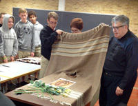 Fr. Gregory gives a lesson on the Virgin of Guadalupe.
