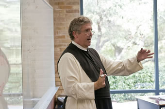 Fr. Gregory teaching English (2010).