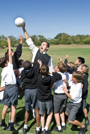 Br. John playing keep away with some second formers (2009).