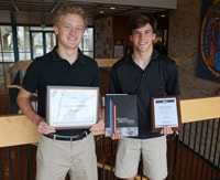 Exodus has received two yearbook awards for last year's book, Band of Brothers: an Award of Achievement from the Interscholastic League Press Conference  and a First Class honor rating from the National Scholastic Press Association  Last year's assistant editors, and this year's editors-in-chief are holding the two awards in this photo.