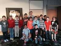 Mr. Nied and Form II English see The Hobbit at Grapevine AMC to celebrate the recent completion of their Hobbit exam.